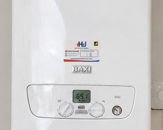 Custom boiler service sticker on a Baxi 800 combi boiler