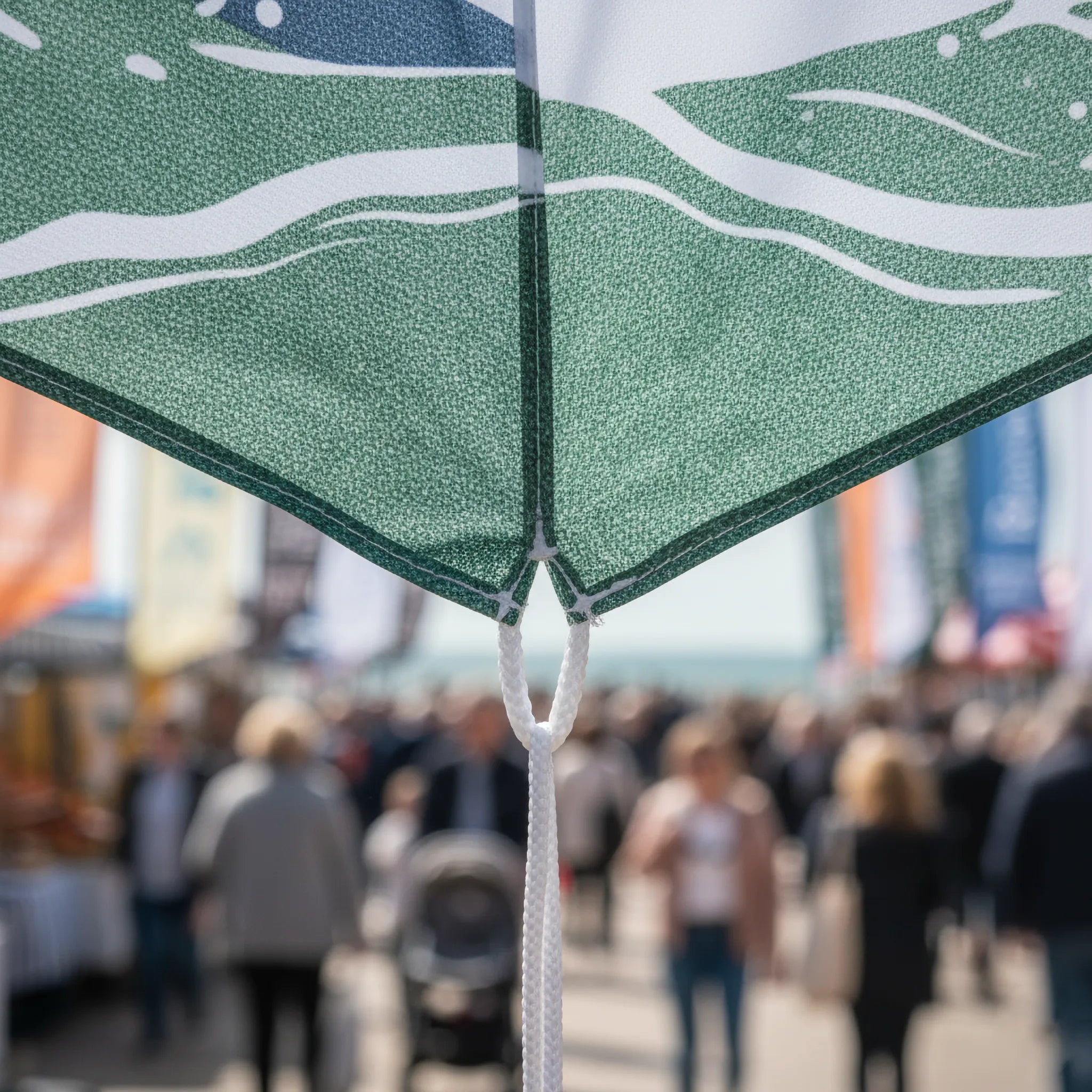 Custom Printed Flags by Capital Letter Signs – detail image showing reinforced stitching and pole sleeve