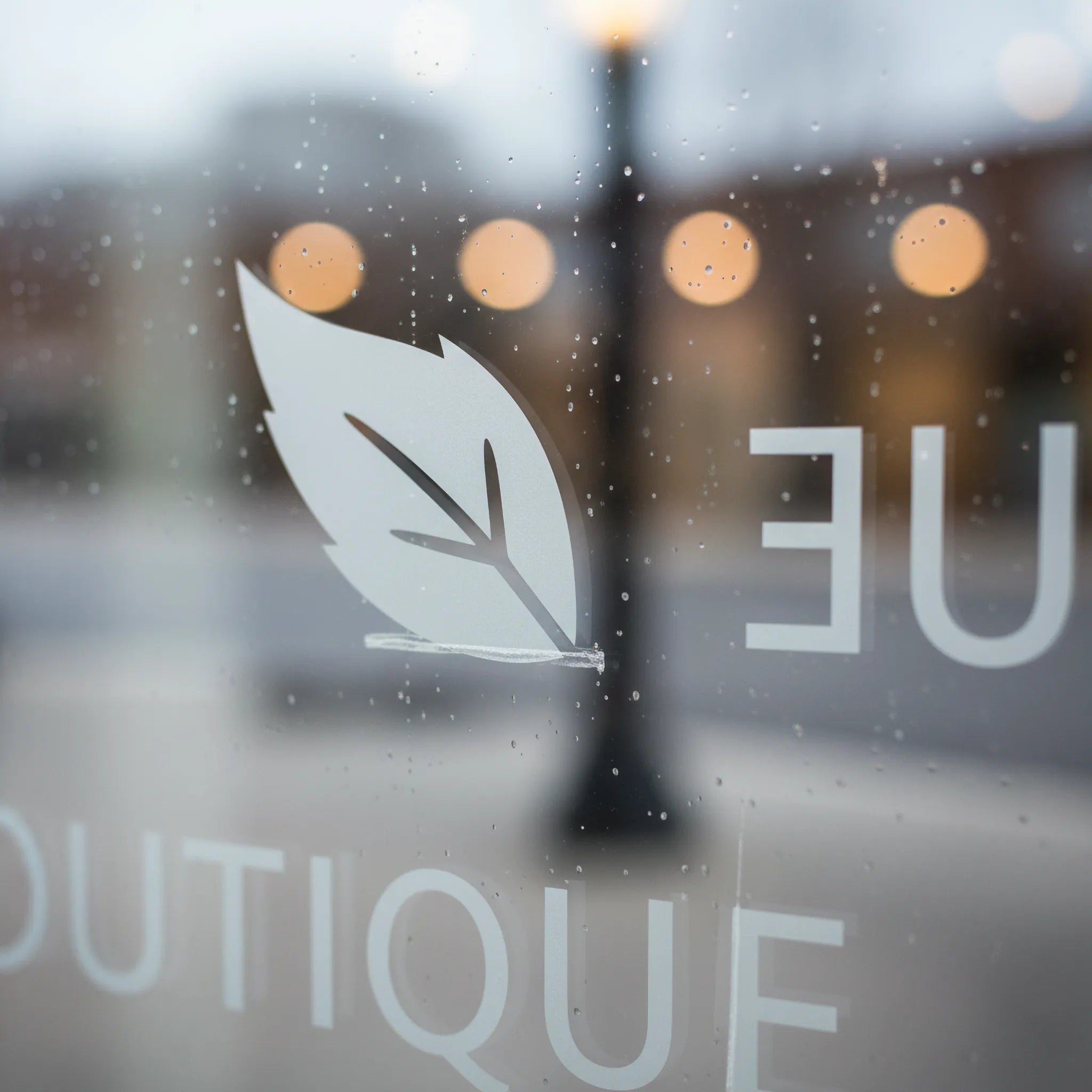 Custom Window Graphics by Capital Letter Signs – detail image highlighting adhesive quality and clarity