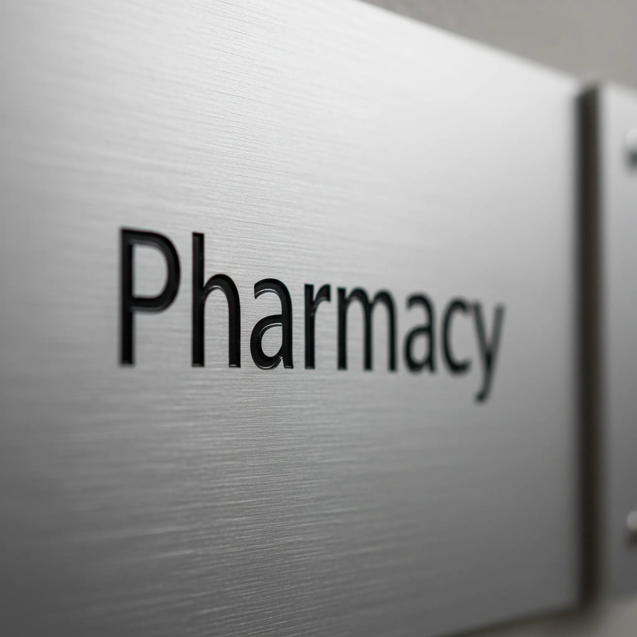 Wayfinding Signs by Capital Letter Signs – detail image of typography and icon design